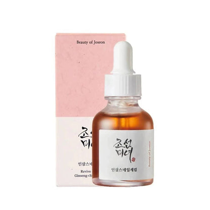 Skincare serum bottle with dropper and pink packaging on a white background